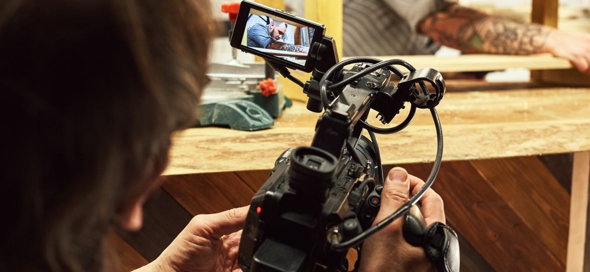 Video production backstage. Behind the scenes of creating video content, a professional team of