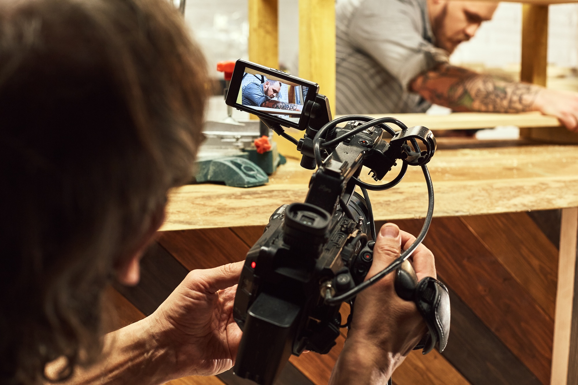 Video production backstage. Behind the scenes of creating video content, a professional team of